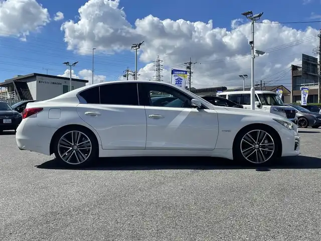 日産 スカイライン ハイブリッド 350GT Type SP 愛知県 2014(平26)年 11.4万km クリスタルホワイトパール (株)IDOMが運営する【じしゃロン名古屋鳴海店】の自社ローン専用車両になりますこちらは現金またはオートローンご利用時の価格です。自社ローンご希望の方は別途その旨お申付け下さい/プッシュスタート/レザーシート/前席パワーシート/シートヒーター/純正ナビ・TV/アラウンドビューモニター/クルーズコントロール/ETC