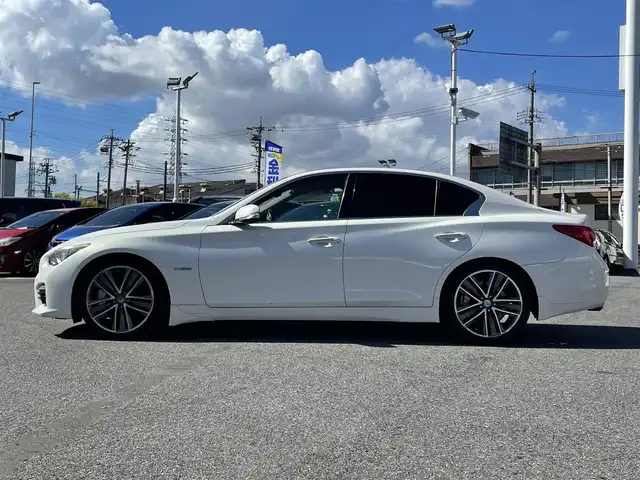 日産 スカイライン ハイブリッド 350GT Type SP 愛知県 2014(平26)年 11.4万km クリスタルホワイトパール (株)IDOMが運営する【じしゃロン名古屋鳴海店】の自社ローン専用車両になりますこちらは現金またはオートローンご利用時の価格です。自社ローンご希望の方は別途その旨お申付け下さい/プッシュスタート/レザーシート/前席パワーシート/シートヒーター/純正ナビ・TV/アラウンドビューモニター/クルーズコントロール/ETC