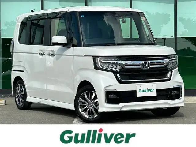 ホンダ Ｎ ＢＯＸ カスタム L 和歌山県 2022(令4)年 6.5万km プラチナホワイトパール 純正7インチナビ/フルセグTV/Bluetooth/CD/DVD/USB/TVキャンセラー/ビルトインETC/バックカメラ/ホンダセンシング/レーダークルーズコントロール/パーキングセンサー/両側パワースライドドア/電動パーキングブレーキ/ブレーキホールド/ステアリングスイッチ/LEDヘッドライト/フォグランプ/オートライト/ヘッドライトレベライザー/前席シートヒーター/リアドアサンシェード/シートバックテーブル/純正14インチAW/ドアバイザー/プッシュスタート/スマートキー/スペアキー/取扱説明書