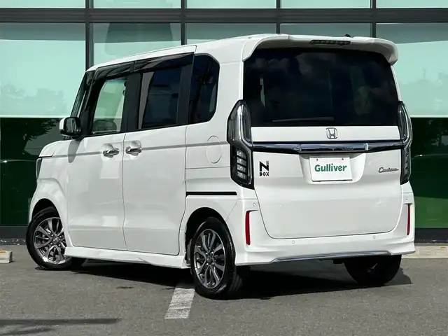 ホンダ Ｎ ＢＯＸ カスタム L 和歌山県 2022(令4)年 6.5万km プラチナホワイトパール 純正7インチナビ/フルセグTV/Bluetooth/CD/DVD/USB/TVキャンセラー/ビルトインETC/バックカメラ/ホンダセンシング/レーダークルーズコントロール/パーキングセンサー/両側パワースライドドア/電動パーキングブレーキ/ブレーキホールド/ステアリングスイッチ/LEDヘッドライト/フォグランプ/オートライト/ヘッドライトレベライザー/前席シートヒーター/リアドアサンシェード/シートバックテーブル/純正14インチAW/ドアバイザー/プッシュスタート/スマートキー/スペアキー/取扱説明書