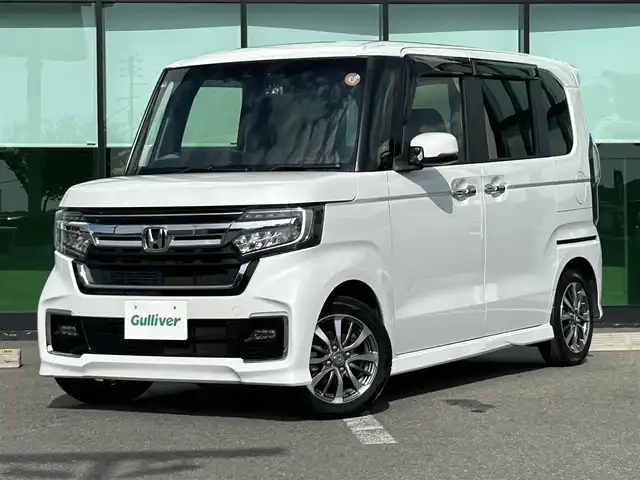 ホンダ Ｎ ＢＯＸ カスタム L 和歌山県 2022(令4)年 6.5万km プラチナホワイトパール 純正7インチナビ/フルセグTV/Bluetooth/CD/DVD/USB/TVキャンセラー/ビルトインETC/バックカメラ/ホンダセンシング/レーダークルーズコントロール/パーキングセンサー/両側パワースライドドア/電動パーキングブレーキ/ブレーキホールド/ステアリングスイッチ/LEDヘッドライト/フォグランプ/オートライト/ヘッドライトレベライザー/前席シートヒーター/リアドアサンシェード/シートバックテーブル/純正14インチAW/ドアバイザー/プッシュスタート/スマートキー/スペアキー/取扱説明書