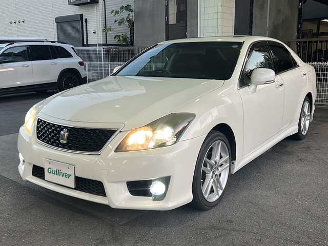 トヨタ クラウン アスリート アニバーサリーエディション 京都府 2012(平24)年 16.5万km ホワイトパールクリスタルシャイン 純正8インチナビ/ワンセグテレビ/走行中視聴可能/DVD視聴可能/Bluetooth/バックカメラ/サンルーフ/本革シート/メモリーパワーシート/シートヒーター＆ベンチレーション/電動リアサンシェード/クルーズコントロール/禁煙車/ビルトインETC/フォグランプ/電動格納ミラー/ウィンカーミラー