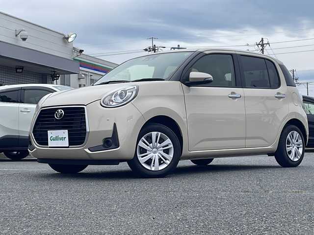 トヨタ パッソ モーダ　チャーム 愛知県 2022(令4)年 0.8万km キナコメタリック /禁煙/ワンオーナー/ディーラー記録簿R5.6//純正ナビ/地デジTV/CD/AUX/BT//全方位カメラ/前後・車内ドラレコ/ビルトインETC//ハーフレザーシート//ステアリングスイッチ//純正LEDオートライト/オートハイビーム//バニティミラー//シートヒーター//オートリトラウインカーミラー//プッシュスタート/スマートキー//コーナーセンサー//アイドリングストップ//純正フロアマット//スペアタイヤ//新車時保証書//取扱説明書//ドラレコ取説//スペアスマートキー有