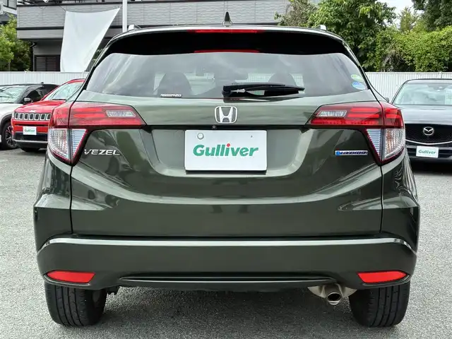 ホンダ ヴェゼル ハイブリッド Z 熊本県 2015(平27)年 11.2万km ミスティックグリーンパール ルーフレール/純正SDナビ(VXM-152VFi)/【フルセグTV/SD/CD/DVD/Bluetooth】/バックカメラ/クルーズコントロール/車両接近通報装置/ハーフレザーシート/前席シートヒーター/パドルシフト/オートLEDライト/ビルトインETC/ドライブレコーダー/横滑り防止装置/盗難防止装置/純正フロアマット/カーテンエアバッグ/プッシュスタート/スマートキー/スペアキー/取扱説明/保証書