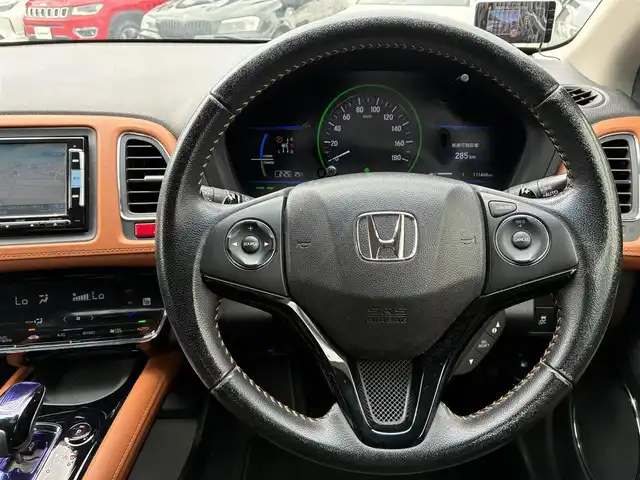 ホンダ ヴェゼル ハイブリッド Z 熊本県 2015(平27)年 11.2万km ミスティックグリーンパール ルーフレール/純正SDナビ(VXM-152VFi)/【フルセグTV/SD/CD/DVD/Bluetooth】/バックカメラ/クルーズコントロール/車両接近通報装置/ハーフレザーシート/前席シートヒーター/パドルシフト/オートLEDライト/ビルトインETC/ドライブレコーダー/横滑り防止装置/盗難防止装置/純正フロアマット/カーテンエアバッグ/プッシュスタート/スマートキー/スペアキー/取扱説明/保証書