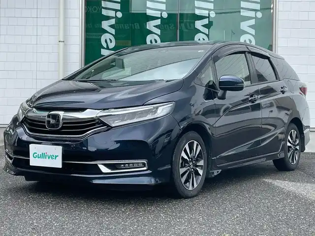 ホンダ シャトル ハイブリッド X ホンダセンシング 新潟県 2020(令2)年 4.1万km ミッドナイトブルービームM ワンオーナー/メモリナビ/フルセグテレビ/バックカメラ/アイドリングストップ/ウィンカーミラー/クルーズコントロール/ドアバイザー/前後ドライブレコーダー/純正フロアマット/運転席助手席シートヒーター