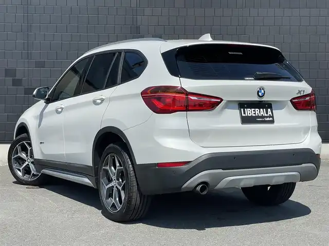 ＢＭＷ Ｘ１ sDrive 18i Xライン 静岡県 2016(平28)年 4.7万km ミネラルホワイト アドバンスド・アクティブセーフティパッケージ/・ドライビング・アシスト・プラス/・ヘッドアップディスプレイ/・アクティブクルーズコントロール/純正HDDナビゲーション/・Bluetooth/USB/AM/FM/バックカメラ/パーキングアシスト/パワーバックドア/ドライブレコーダー（前後）/コンフォート・アクセス/ライト・パッケージ/アロイ・ホイールバイカラー19インチ