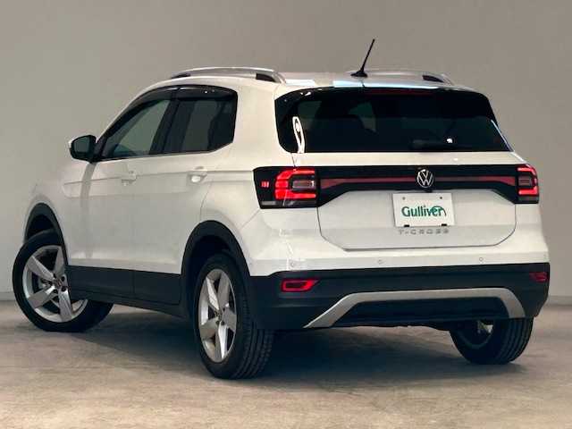 フォルクスワーゲン ＶＷ Ｔ－クロス TSI アクティブ 宮城県 2023(令5)年 1.9万km 白 アダプティブ・クルーズ・コントロール/リヤクロストラフィックアラート/ブラインドスポットモニター/レーンアシスト/純正ナビ/（Discover Pro）/・バックカメラ/・Bluetooth/USB/Apple Carplay/AndroidAuto/・純正ビルトインETC2.0/前後コーナーセンサー/MTモード付きAT/ルーフレール/プッシュスタート/スマートキー/・スペアキー/アイドリングストップ/純正LEDヘッドライト/・オートライト/・フォグランプ/純正アルミホイール/純正フロアマット