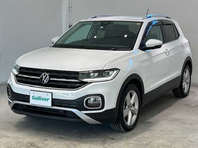 フォルクスワーゲン ＶＷ Ｔ－クロス TSI アクティブ 宮城県 2023(令5)年 1.9万km 白 アダプティブ・クルーズ・コントロール/リヤクロストラフィックアラート/ブラインドスポットモニター/レーンアシスト/純正ナビ/（Discover Pro）/・バックカメラ/・Bluetooth/USB/Apple Carplay/AndroidAuto/・純正ビルトインETC2.0/前後コーナーセンサー/MTモード付きAT/ルーフレール/プッシュスタート/スマートキー/・スペアキー/アイドリングストップ/純正LEDヘッドライト/・オートライト/・フォグランプ/純正アルミホイール/純正フロアマット