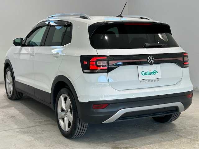 フォルクスワーゲン ＶＷ Ｔ－クロス TSI アクティブ 宮城県 2023(令5)年 1.9万km 白 アダプティブ・クルーズ・コントロール/リヤクロストラフィックアラート/ブラインドスポットモニター/レーンアシスト/純正ナビ/（Discover Pro）/・バックカメラ/・Bluetooth/USB/Apple Carplay/AndroidAuto/・純正ビルトインETC2.0/前後コーナーセンサー/MTモード付きAT/ルーフレール/プッシュスタート/スマートキー/・スペアキー/アイドリングストップ/純正LEDヘッドライト/・オートライト/・フォグランプ/純正アルミホイール/純正フロアマット