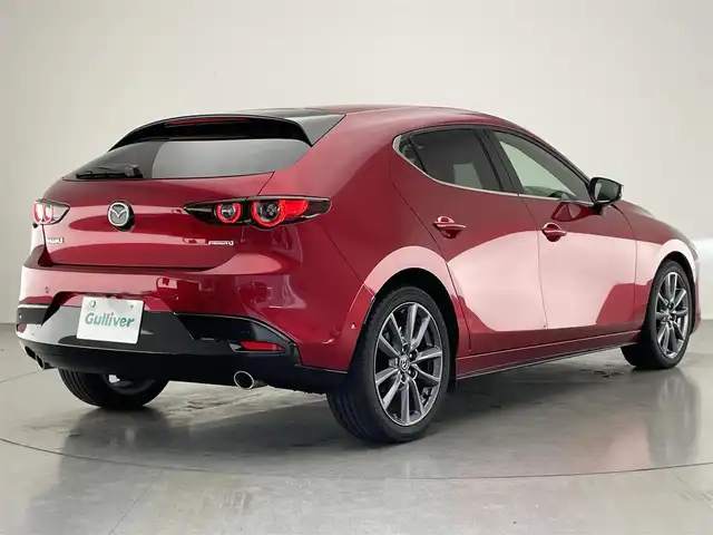 マツダ マツダ３ファストバック XD Lパッケージ 愛知県 2019(令1)年 3.7万km ソウルレッドクリスタルM 純正８．８型ナビ　ＨＤＭＩ　黒革　全方位カメラ　禁煙車　ＢＳＭ　フルセグＴＶ　前後ドラレコ　ＥＴＣ　シートヒーター　衝突軽減　追従クルコン　社外アルミ付スタッドレス４本積込　ＬＥＤオートライト　フォグ