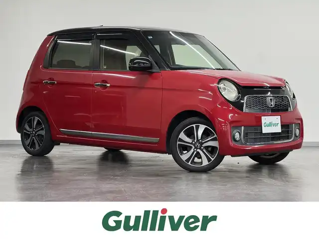 ホンダ Ｎ ＯＮＥ プレミアム ツアラー Lパッケージ 三重県 2013(平25)年 8万km ミラノレッド ガソリン・ターボ/FF/MTモード付 インパネCVT/6.2インチナビ NX513/（FM/AM/CD/DVD/TV/SD/Bluetooth/AUX/USB/iPod）/バックカメラ/ETC/安全/・VSA（ABS・横滑り抑制・TCS）/・運転席・助手席エアバッグ/など/装備/・クルーズコントロール/・パドルシフト/・オートエアコン/・オートライト/・キセノンヘッドライト/・ステアリングスイッチ/・ECONスイッチ/・プッシュスタート/・スマートキーx2/・電動格納ドアミラー/・純正15inAW/・2トーン外装色『ミラノレッド＆ブラック』［R81E］/など
