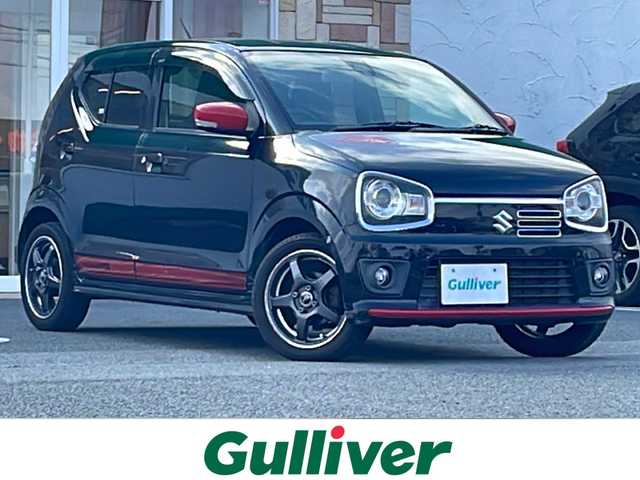 スズキ アルト ターボRS 徳島県 2017(平29)年 10.2万km ブルーイッシュブラックパール3 衝突軽減ブレーキ/純正7インチナビ/（Bluetooth/フルセグTV/CD/DVD/SD/AUX/ipod）/インタークーラーターボ/パドルシフト/シートヒーター/HIDヘッドライト/オートライト/ETC/ドライブレコーダー/電格ミラー/ドアバイザー/社外AW/純正フロアマット/プッシュスタート/スマートキー