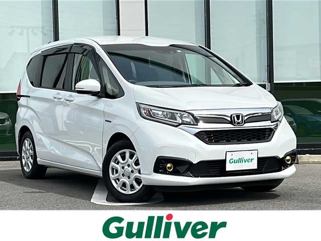 ホンダ フリード ハイブリット G ホンダセンシング 岐阜県 2020(令2)年 6.4万km プラチナホワイトパール ＳＤナビ　/両側パワスラ　/バックカメラ　/衝突被害軽減装置　/コーナーセンサー　/３列シート　/ワンセグ　/ビルトインＥＴＣ/クルーズコントロール　/ＬＥＤヘッドライト　/スマートキー　/プッシュスタート　/ＵＳＢ/ドアバイザー/Blue tooth/SDミュージックサーバー/フルフラットシート/ウォークスルー/純正フロアマット/シートヒーターD＋N席/純正アルミホイール/レーンキープアシスト/オートライト/エアバッグW