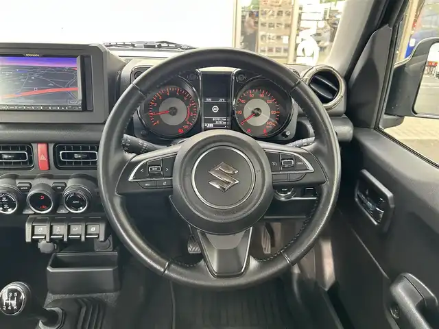 スズキ ジムニー XC 埼玉県 2021(令3)年 3.4万km ブルーイッシュブラックパール3 4WD/社外ナビ/（ワンセグTV/BT/CD/DVD/FM）/バックカメラ/クルーズコントロール/両側シートヒーター/スマートスペアキー×1/プッシュスタート/純正フロアマット/オートLEDライト/純正16インチAW/背面タイヤあり/ダウンヒルアシストコントロール/車線逸脱警報/ウィンカーミラー/シガーソケット/車両取扱説明書/保証書