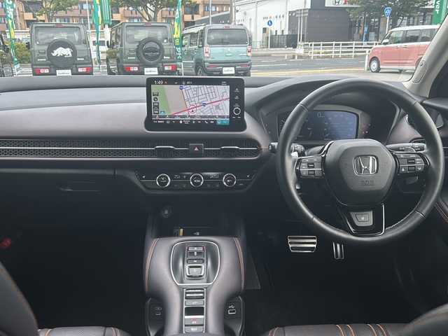 ホンダ ＺＲ－Ｖ ハイブリッド e:HEV Z 鳥取県 2024(令6)年 1.7万km プラチナホワイトパール ホンダセンシング/・衝突軽減ブレーキ/近距離衝突軽減ブレーキ/・先行車発進お知らせ機能/・歩行者事故軽減ステアリング/・路外逸脱抑制機能/・標識認識機能/・渋滞追従機能付アダプティブクルーズコントロール/・車線維持支援システム/・渋滞運転支援機能/・ブラインドスポットインフォメーション/・前後誤発進抑制機能/・パーキングセンサーシステム/全方位モニター/マルチビューカメラシステム/9型ワイドHonda CONNECTディスプレー/・ナビ/フルセグ/Bluetooth/BOSEプレミアムサウンドシステム（12スピーカー）/ビルトインETC2.0/置くだけ充電/本革シート/・シートヒーター/前席パワーシート/D席メモリーシート/パワーバックドア/純正18AW