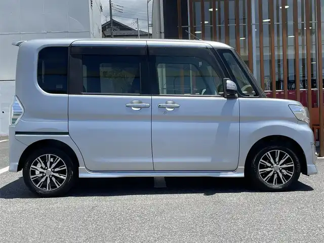 ダイハツ タント カスタム X トップED SAⅡ 千葉県 2015(平27)年 9.1万km ブライトシルバーメタリック (株)IDOMが運営する【じしゃロン八千代店】の自社ローン専用車両になります。/こちらは現金またはオートローンご利用時の価格です。自社ローンご希望の方は別途その旨お申付け下さい/片側電動スライドドア/衝突軽減システム「スマートアシスト２」/フルセグTVナビ/Bluetoothオーディオ対応