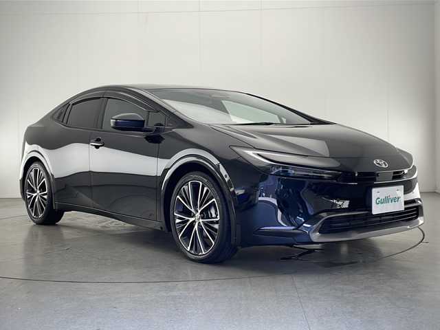 トヨタ プリウス Z 熊本県 2023(令5)年 1.3万km 黒 禁煙車/トヨタセーフティセンス/純正12.3型ディスプレイオーディオナビTV/（T-CONNECT/USB/HDMI/FMAM/Bluetooth/フルセグTV）/純正ビルトイン2.0ETC/純正19インチアルミ/純正LEDオートライト/純正フロアマット/プリクラッシュセーフティ/アダプティブクルーズコントロール/レーンディパーチャーアラート/オートマチックハイビーム/パーキングアシスト/クリアランスソナー/ブラインドスポットモニター/デジタルミラー/電子パーキング/オートホールド/パワーバックドア/AC100V/オートエアコン/前席シートヒーター/エアシート/運転席パワーシート/本革巻ハンドル/スマートキー/プッシュエンジンスタート