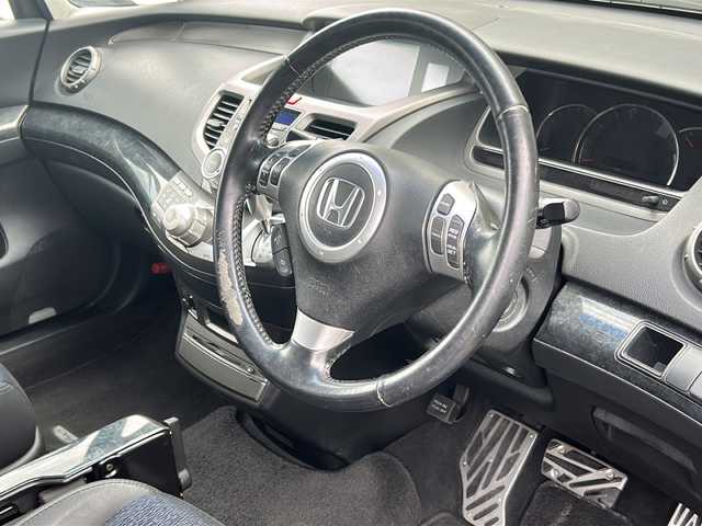 ホンダ オデッセイ アブソルート 富山県 2006(平18)年 16.6万km ダークフォレストパール クルーズコントロール/MTモード付AT/純正ナビ(ナビ確認不可)/バックカメラ(確認不可)/純正アルミホイール/純正フロアマット/三列シート/オートライト/ハロゲンヘッドライト/リモコンキー/スペアキー/盗難防止装置/電動格納ミラー