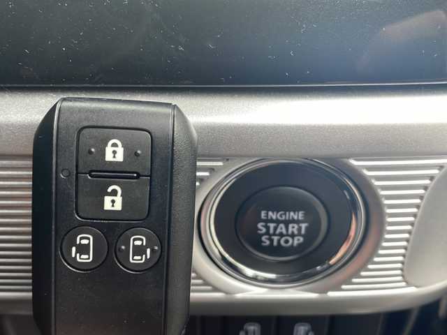 スズキ スペーシア カスタム HYBRID XS 山口県 2021(令3)年 1.6万km ブルーイッシュブラックパール3 禁煙車/社外メモリナビ/(CD/DVD/Bluetooth/フルセグTV)/バックカメラ/ドライブレコーダー(前方のみ)/両側パワースライドドア/衝突軽減ブレーキ/レーンキープアシスト/レーダークルーズコントロール/コーナーセンサー/ハーフレザーシート/D席シートヒーター/レザー調シートカバー/ステアリングスイッチ/アイドリングストップ/オートライト/LEDヘッドランプ/フォグランプ/プッシュスタート/スマートキー×２/純正アルミホイール/純正フロアマット/後席サンシェード/取扱説明書/保証書/記録簿