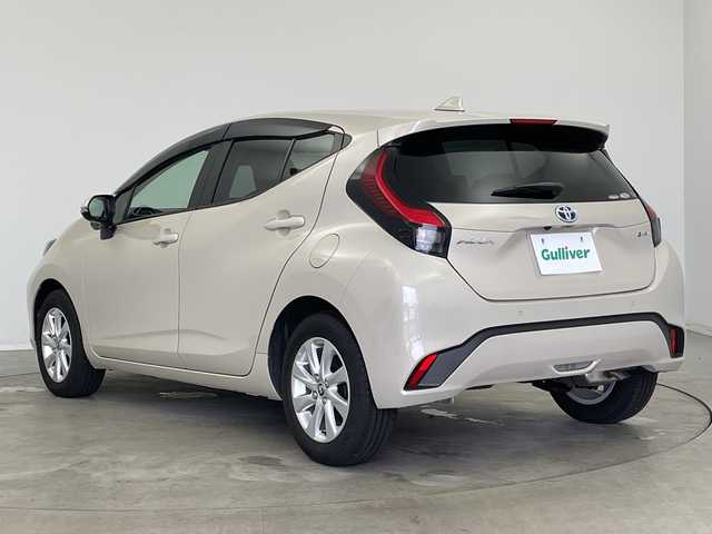 トヨタ アクア Z 新潟県 2024(令6)年 0.3万km クリアベージュメタリック 純正メモリナビ/　Bluetooth/CD/DVD/USB/トヨタセーフティセンス/・プリクラッシュセーフティ/・先行車発進告知機能/・レーントレーシングアシスト/・レーダークルーズコントロール/・オートマチックハイビーム/・ロードサインアシスト/ブラインドスポットモニター/リヤクロストラフィックアラート/パーキングサポートブレーキ/前後コーナーセンサー/前後ドライブレコーダー/バックモニター/ビルトインETC2.0/オートライト/レザーステアリング