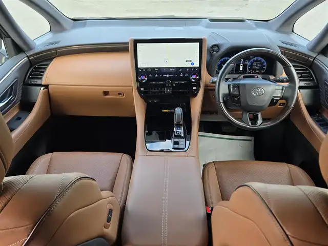 トヨタ ヴェルファイア ハイブリット Z プレミア 鹿児島県 2023(令5)年 3.5万km ブラック デジタルインナーミラー　/後席フリップダウンモニター　/ＨＤＭＩ入力端子　/トヨタセーフティセンス　/トヨタチームメイト　/ＴＶキャンセラー　/ブラウンレザーシート　/ヘッドアップディスプレイ　/ビルトインＥＴＣ２．０/全席シートヒーター/全席ベンチレーション/全席パワーシート/ステアリングヒーター/パーキングアシスト/パノラミックビューモニター/両側パワースライドドア/左右独立ムーンルーフ/前後ドライブレコーダー/レーダークルーズコントロール/ＭＴモード付きＡＴ/パドルシフト/純正アルミホイール(19インチ)/ワイヤレス充電/リヤフィルム施工/コーティング施工証明書付き/前後コーナーセンサー/プッシュスタート/スマートキー/エアバック(W+サイド)