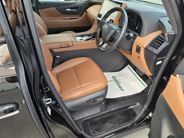 トヨタ ヴェルファイア ハイブリット Z プレミア 鹿児島県 2023(令5)年 3.5万km ブラック デジタルインナーミラー　/後席フリップダウンモニター　/ＨＤＭＩ入力端子　/トヨタセーフティセンス　/トヨタチームメイト　/ＴＶキャンセラー　/ブラウンレザーシート　/ヘッドアップディスプレイ　/ビルトインＥＴＣ２．０/全席シートヒーター/全席ベンチレーション/全席パワーシート/ステアリングヒーター/パーキングアシスト/パノラミックビューモニター/両側パワースライドドア/左右独立ムーンルーフ/前後ドライブレコーダー/レーダークルーズコントロール/ＭＴモード付きＡＴ/パドルシフト/純正アルミホイール(19インチ)/ワイヤレス充電/リヤフィルム施工/コーティング施工証明書付き/前後コーナーセンサー/プッシュスタート/スマートキー/エアバック(W+サイド)