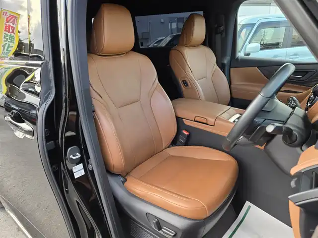 トヨタ ヴェルファイア ハイブリット Z プレミア 鹿児島県 2023(令5)年 3.5万km ブラック デジタルインナーミラー　/後席フリップダウンモニター　/ＨＤＭＩ入力端子　/トヨタセーフティセンス　/トヨタチームメイト　/ＴＶキャンセラー　/ブラウンレザーシート　/ヘッドアップディスプレイ　/ビルトインＥＴＣ２．０/全席シートヒーター/全席ベンチレーション/全席パワーシート/ステアリングヒーター/パーキングアシスト/パノラミックビューモニター/両側パワースライドドア/左右独立ムーンルーフ/前後ドライブレコーダー/レーダークルーズコントロール/ＭＴモード付きＡＴ/パドルシフト/純正アルミホイール(19インチ)/ワイヤレス充電/リヤフィルム施工/コーティング施工証明書付き/前後コーナーセンサー/プッシュスタート/スマートキー/エアバック(W+サイド)