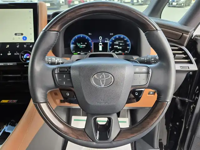 トヨタ ヴェルファイア ハイブリット Z プレミア 鹿児島県 2023(令5)年 3.5万km ブラック デジタルインナーミラー　/後席フリップダウンモニター　/ＨＤＭＩ入力端子　/トヨタセーフティセンス　/トヨタチームメイト　/ＴＶキャンセラー　/ブラウンレザーシート　/ヘッドアップディスプレイ　/ビルトインＥＴＣ２．０/全席シートヒーター/全席ベンチレーション/全席パワーシート/ステアリングヒーター/パーキングアシスト/パノラミックビューモニター/両側パワースライドドア/左右独立ムーンルーフ/前後ドライブレコーダー/レーダークルーズコントロール/ＭＴモード付きＡＴ/パドルシフト/純正アルミホイール(19インチ)/ワイヤレス充電/リヤフィルム施工/コーティング施工証明書付き/前後コーナーセンサー/プッシュスタート/スマートキー/エアバック(W+サイド)