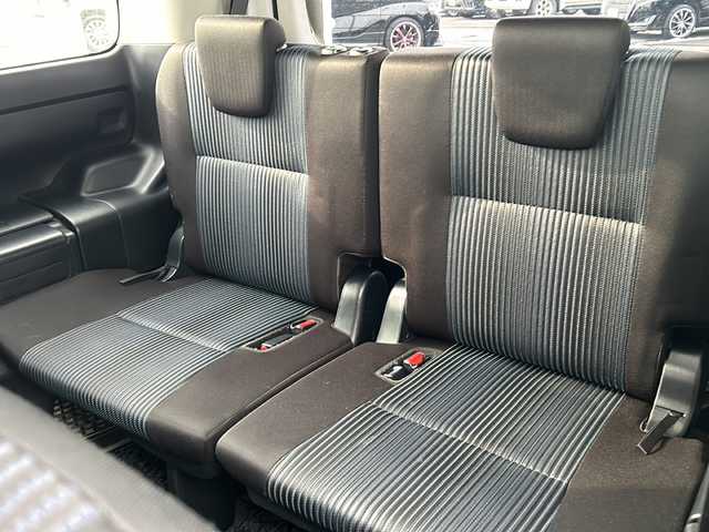 トヨタ ヴォクシー ZS 煌Ⅱ 道東・釧路十勝 2017(平29)年 11.5万km ホワイトパールクリスタルシャイン ・4WD/・純正9インチメモリナビ/（CD/DVD/BT/SD/USB）/・両側パワースライドドア/・バックカメラ/・純正12.9インチフリップダウンモニター/・モデリスタリップスポイラー/・ETC/・ドアバイザー/・アイドリングストップ/・LEDヘッドライト/・フォグランプ/・オートライト/・オートマチックハイビーム/・プッシュスタート/・スマートキー/・純正アルミホイール