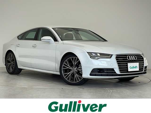 アウディ Ａ７ SB 2．0 TFSI クワトロ 愛知県 2016(平28)年 10万km 白 衝突軽減システム/BOSEプレミアムサウンド/純正９型SDナビ/クルーズコントロール/シートヒーター/ワンセグ/Bluetooth/バックカメラ/電動リアゲート/パワーシート/コーナーセンサー/純正アルミホイール/LEDヘッドライト/ステアリングスイッチ/スマートキー/プッシュスタート