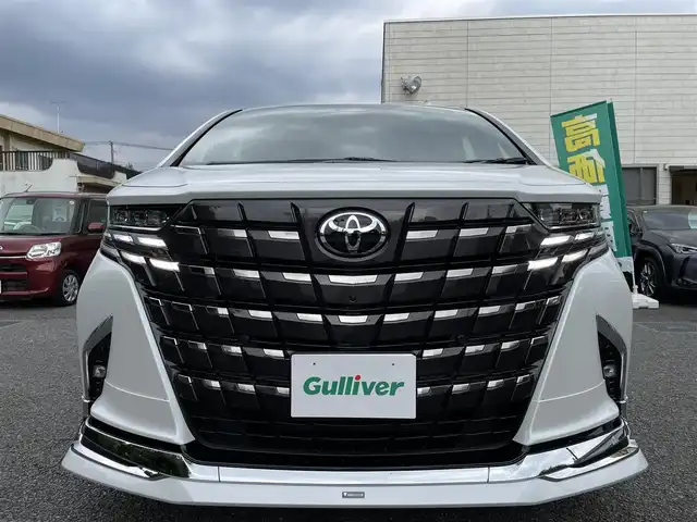 トヨタ アルファードハイブリット Z 東京都 2024(令6)年 0.4万km プラチナホワイトパールマイカ ワンオーナー/モデリスタエアロ/・フロントスポイラー/・サイドスカート/・リヤスタイリングキット/（リヤスカート＋ドレスアップマフラー）/純正ディスプレイオーディオナビ（14インチ）/・Bluetoothオーディオ/・フルセグTV/カラーヘッドアップディスプレイ/寒冷地仕様/左右独立ムーンルーフ/Toyota Safety Sense/両側パワースライドドア/パワーバックドア/合成皮革ブラックシート/・パワーシート（1列目）/・シートヒーター/ベンチレーション（1列目/2列目）/ETC2.0/保証書/取扱説明書/スペアキー