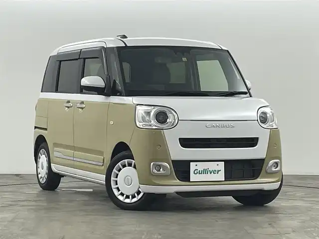 ダイハツ ムーヴ キャンバス ストライプス G 福島県 2022(令4)年 1.8万km シャイニングホワイトパール/サンドベージュメタリック スマートアシスト　/・衝突軽減/・車線逸脱警報/・オートマチックハイビーム/・コーナーセンサー/バックカメラ　/両側パワースライドドア　/社外ディスプレイオーディオ　/ステアリングスイッチ　/・革巻きステアリング/・チルトステアリング/・革巻きステアリング/シートヒーター　/プッシュスタート/・スマートキー　/オートライト　/・ＬＥＤライト　/・フォグライト/電子パーキング/・ブレーキホールド/