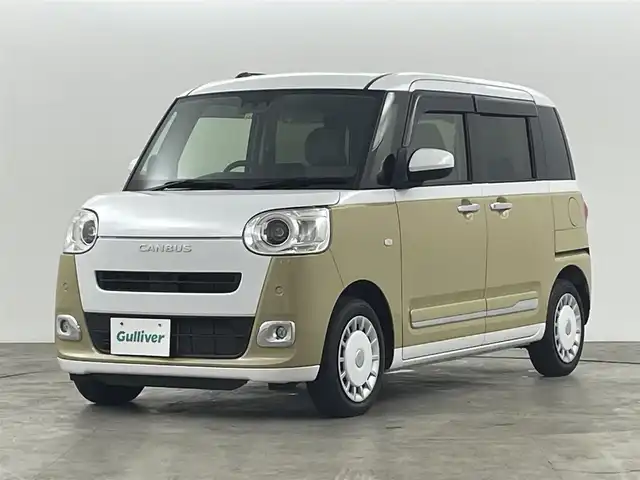ダイハツ ムーヴ キャンバス ストライプス G 福島県 2022(令4)年 1.8万km シャイニングホワイトパール/サンドベージュメタリック スマートアシスト　/・衝突軽減/・車線逸脱警報/・オートマチックハイビーム/・コーナーセンサー/バックカメラ　/両側パワースライドドア　/社外ディスプレイオーディオ　/ステアリングスイッチ　/・革巻きステアリング/・チルトステアリング/・革巻きステアリング/シートヒーター　/プッシュスタート/・スマートキー　/オートライト　/・ＬＥＤライト　/・フォグライト/電子パーキング/・ブレーキホールド/