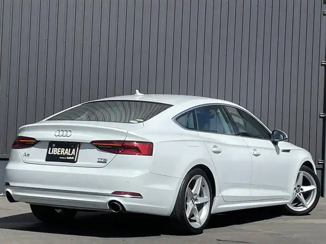 アウディ Ａ５ SB2．0TFSI Q スポーツ 青森県 2017(平29)年 4.8万km アイビスホワイト /4WD/ターボ/バーチャルコックピット/純正メモリーナビ/　(フルセグTV/BT/DVD/AUX)/ETC/ACC/バックカメラ/前後バンパーソナー/前席パワーシートヒーター/黒レザーシート/パワーバックドア/純正18インチアルミ/LEDヘッドライト/ブラインドスポットモニター/革巻きステア/ノブ/パドルシフト/ヘットライトウオッシャー/オートライト/オートワイパー/ミラーヒーター/レーンキピングアシスト/W/サイド/カーテンエアバッグ /ABS/スマートキーx2/保証書/取説