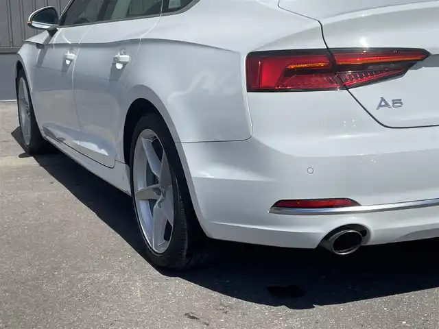 アウディ Ａ５ SB2．0TFSI Q スポーツ 青森県 2017(平29)年 4.8万km アイビスホワイト /4WD/ターボ/バーチャルコックピット/純正メモリーナビ/　(フルセグTV/BT/DVD/AUX)/ETC/ACC/バックカメラ/前後バンパーソナー/前席パワーシートヒーター/黒レザーシート/パワーバックドア/純正18インチアルミ/LEDヘッドライト/ブラインドスポットモニター/革巻きステア/ノブ/パドルシフト/ヘットライトウオッシャー/オートライト/オートワイパー/ミラーヒーター/レーンキピングアシスト/W/サイド/カーテンエアバッグ /ABS/スマートキーx2/保証書/取説