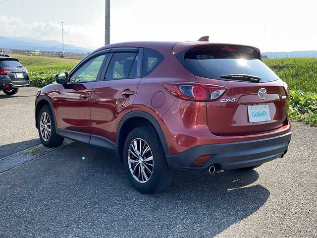 マツダ ＣＸ－５ XD 新潟県 2012(平24)年 10.4万km ジールレッドマイカ 4WD/社外HDDナビ(AVIC-ZH77)/CD/DVD/BT/フルセグテレビ/ミュージックサーバー/バックカメラ/ETC/フリップダウンモニター/クルーズコントロール/ステアリングスイッチ/スマートキー/プッシュスタート/キセノンヘッドライト/オートライト/フォグランプ/社外17インチアルミホイール
