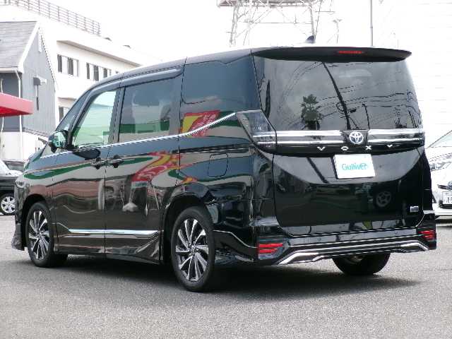 トヨタ ヴォクシー ハイブリッド S－Z 岡山県 2023(令5)年 3.5万km アティチュードブラックマイカ 【 Toyota Safety Sense 】/・LDA/・PCS/・RSA/・AHB/・PDA/PKSB/オートライト/レーダークルーズコントロール/モデリスタエアロ/ディスプレイオーディオプラス/車載メモリーナビ/14型有機ELフリップダウンモニター/バックカメラ/DVD再生可能/AppleCarPlay/AndroidAuto/Bluetooth/HDMI/AC100V/USB（前席・2ｎｄシート）/DVDデッキ/パワーバックドア/両側パワースライドドア/ハンズフリーデュアルパワースライドドア/ユニバーサルステップ/ハーフレザーシート/シートヒーター（D/N/2ｎｄシート）/純正ドライブレコーダー（フロント・リア）/2.0対応ビルトインETC/純正フロアマット/純正17AW/スマートキー2個