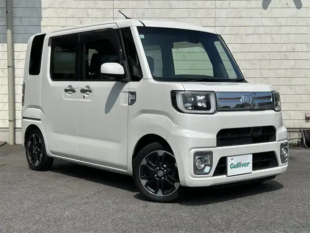 ダイハツ ウェイク G ターボ　レジャーエディション SA Ⅱ 大分県 2017(平29)年 7.6万km パールホワイトⅢ 純正SDナビゲーション(NSZN-X67D)/【フルセグTV/Bluetooth/DVD/CD/SD/ラジオ】/純正後席用モニター/外部端子接続：USB/HDMI/両側パワースライドドア/LEDヘッドライト/フロントフォグランプ/バックカメラ/ETC/スマートアシストII/・衝突警報機能	/・衝突回避支援ブレーキ機能/・車線逸脱警報機能/・誤発進抑制機能(前後)/・先行車発進お知らせ機能	/ステアリングスイッチ/純正15インチアルミホイール/純正フロアマット/純正ドアバイザー/スマートキー2本/保証書/取扱説明書