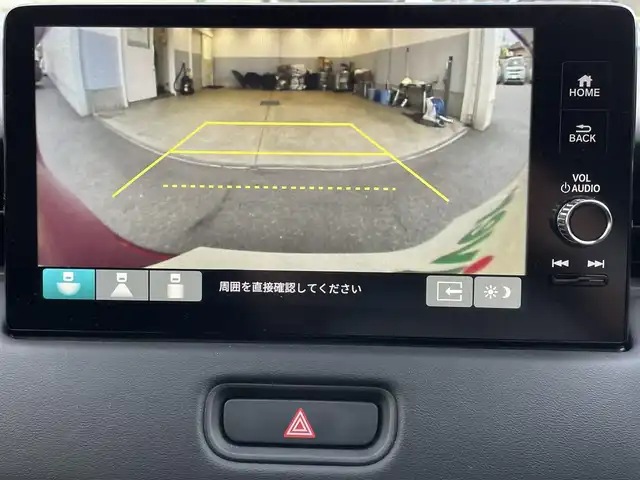 ホンダ ヴェゼル ハイブリッド e:HEV X 栃木県 2023(令5)年 1.6万km プレミアムクリスタルレッドM ワンオーナー/ホンダディスプレイ/フルセグ　TV　/Bluetooth　CD　DVD/バックカメラ/・ホンダセンシング/・衝突軽減ブレーキ/・路外逸脱抑制機能/・先行車発進お知らせ機能/・標識認識機能/・トラフィックジャムアシスト/・誤発進抑制機能/・後方誤発進抑制機能/・近距離衝突軽減ブレーキ/・急アクセル抑制機能/・コーナーセンサー/ダウンヒルアシストコントロール/電子パーキングブレーキ/置くだけ充電/オートライト/ヘッドライトLED/ETC