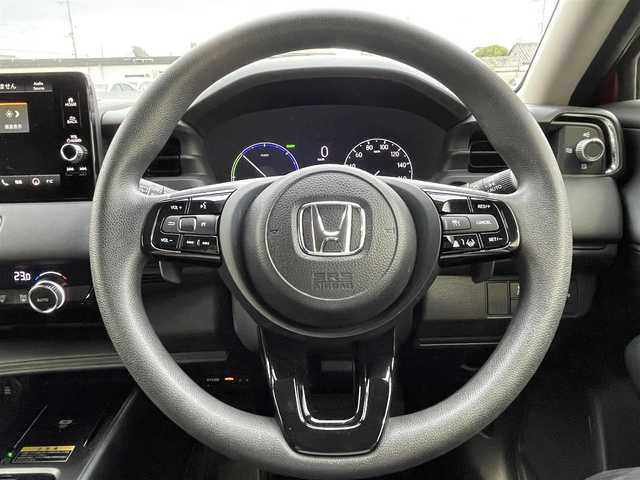 ホンダ ヴェゼル ハイブリッド e:HEV X 栃木県 2023(令5)年 1.6万km プレミアムクリスタルレッドM ワンオーナー/ホンダディスプレイ/フルセグ　TV　/Bluetooth　CD　DVD/バックカメラ/・ホンダセンシング/・衝突軽減ブレーキ/・路外逸脱抑制機能/・先行車発進お知らせ機能/・標識認識機能/・トラフィックジャムアシスト/・誤発進抑制機能/・後方誤発進抑制機能/・近距離衝突軽減ブレーキ/・急アクセル抑制機能/・コーナーセンサー/ダウンヒルアシストコントロール/電子パーキングブレーキ/置くだけ充電/オートライト/ヘッドライトLED/ETC