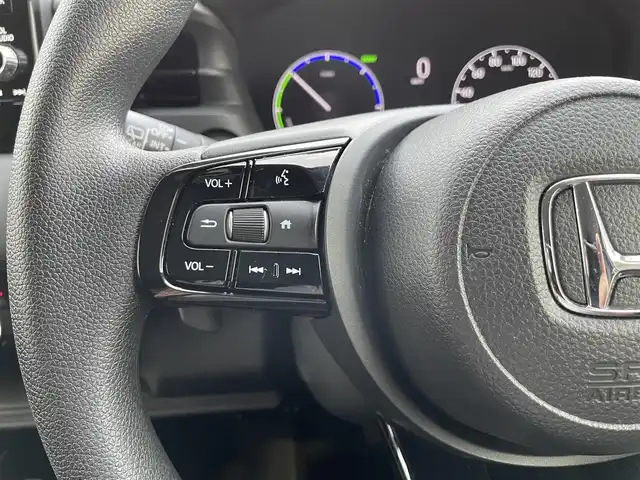 ホンダ ヴェゼル ハイブリッド e:HEV X 栃木県 2023(令5)年 1.6万km プレミアムクリスタルレッドM ワンオーナー/ホンダディスプレイ/フルセグ　TV　/Bluetooth　CD　DVD/バックカメラ/・ホンダセンシング/・衝突軽減ブレーキ/・路外逸脱抑制機能/・先行車発進お知らせ機能/・標識認識機能/・トラフィックジャムアシスト/・誤発進抑制機能/・後方誤発進抑制機能/・近距離衝突軽減ブレーキ/・急アクセル抑制機能/・コーナーセンサー/ダウンヒルアシストコントロール/電子パーキングブレーキ/置くだけ充電/オートライト/ヘッドライトLED/ETC