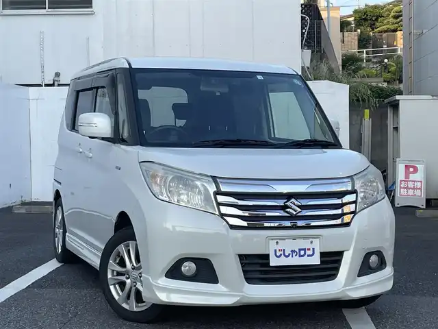 スズキ ソリオ HV MZ 千葉県 2018(平30)年 11.9万km ピュアホワイトP (株)IDOMが運営する【じしゃロン八千代店】の自社ローン専用車両になります。こちらは現金またはオートローンご利用時の価格です。自社ローンご希望の方は別途その旨お申付け下さい/純正ナビ/フルセグTV/CD/DVD/Bluetooth/両側パワースライド/全周囲カメラ/ETC