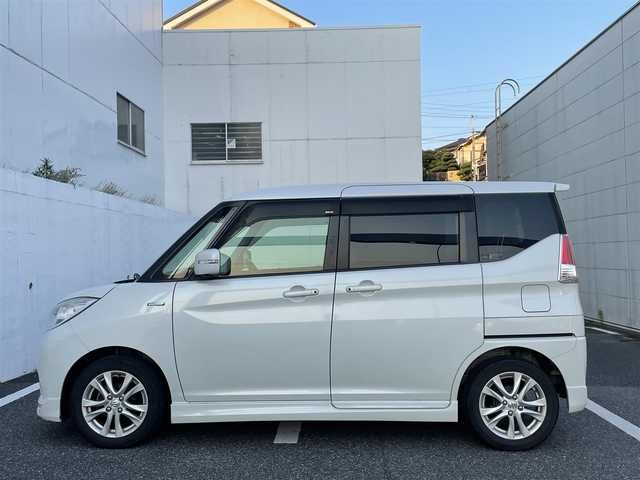 スズキ ソリオ HV MZ 千葉県 2018(平30)年 11.9万km ピュアホワイトP (株)IDOMが運営する【じしゃロン八千代店】の自社ローン専用車両になります。こちらは現金またはオートローンご利用時の価格です。自社ローンご希望の方は別途その旨お申付け下さい/純正ナビ/フルセグTV/CD/DVD/Bluetooth/両側パワースライド/全周囲カメラ/ETC