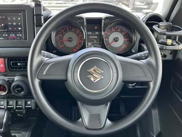 スズキ ジムニー XL 愛知県 2024(令6)年 2.2万km ミディアムグレー /禁煙ワンオーナー//4WD//ディスプレイオーディオ(ATOTO)BT/USB/YouTube//ミラー型前後ドライブレコーダー(JADO　T860-1)//ルーフキャリア(YAKIMA)//ヒッチカゴキャリア(CURT)//ETC//MTタイヤ(ヨコハマ　ジオランダー　185/85/R16)//シートヒーター//スペアスマートキー//LEDヘッドランプ//オートLEDヘッドライト//ヘッドライトレベライザー//フォグランプ//電動格納ミラー//アイドリングストップ//プリクラッシュ//横滑り防止装置//レーンキープアシスト//デフロック//ダウンヒルコントロール//トランスファーレバー//TPUフロアマット//TPUラゲージトレイ//ドリンクホルダー//LEDルームランプ//スペアタイヤカバー//取扱説明書