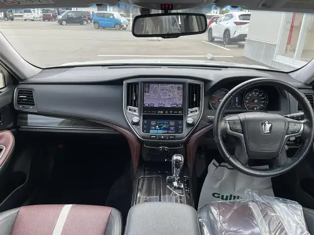 トヨタ クラウン ハイブリッド アスリートS Four ブラック 石川県 2015(平27)年 5.4万km ホワイトパールクリスタルシャイン 4WD/純正メモリーナビ/フルセグTV/バックカメラ/LEDヘッドライト/ETC/スマートキー/プッシュスタート/電動ミラー/革シート/クルーズコントロール/純正アルミホイール/オートライト/コーナーセンサー/ステアリングリモコン
