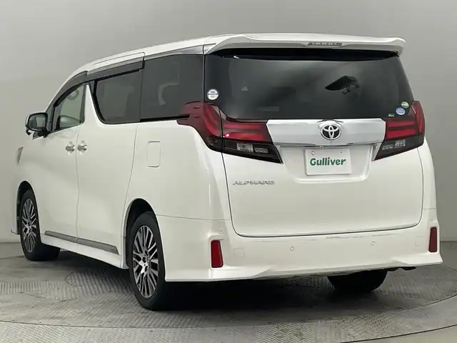 トヨタ アルファード S Cパッケージ 道央・札幌 2016(平28)年 6.8万km ホワイトパールクリスタルシャイン ・４WD/・アルパインナビ/　CD／DVD／Bluetooth／フルセグ/・バックカメラ/・アルパインフリップダウンモニター/・純正FSRガーニッシュ/・両側パワースライドドア/・純正ビルトインETC/・社外ドライブレコーダー（CSD-500FHR）/・クリアランスソナー/・横滑り防止装置/・アイドリングストップ/・電動パーキングブレーキ/・ブレーキホールド/・ステアリングヒーター/・電動リアゲート/・ハーフレザーシート/・パワーシート/・純正AW18インチ/・純正フロアマット/・LEDヘッドライト/・フォグライト/・スマートキー/・プッシュスタート