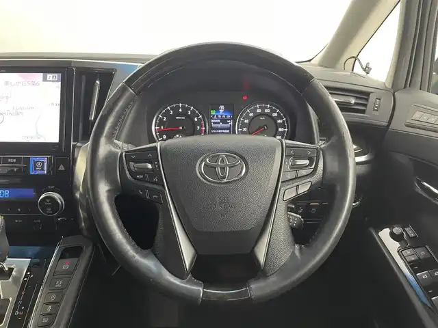 トヨタ アルファード S Cパッケージ 道央・札幌 2016(平28)年 6.8万km ホワイトパールクリスタルシャイン ・４WD/・アルパインナビ/　CD／DVD／Bluetooth／フルセグ/・バックカメラ/・アルパインフリップダウンモニター/・純正FSRガーニッシュ/・両側パワースライドドア/・純正ビルトインETC/・社外ドライブレコーダー（CSD-500FHR）/・クリアランスソナー/・横滑り防止装置/・アイドリングストップ/・電動パーキングブレーキ/・ブレーキホールド/・ステアリングヒーター/・電動リアゲート/・ハーフレザーシート/・パワーシート/・純正AW18インチ/・純正フロアマット/・LEDヘッドライト/・フォグライト/・スマートキー/・プッシュスタート