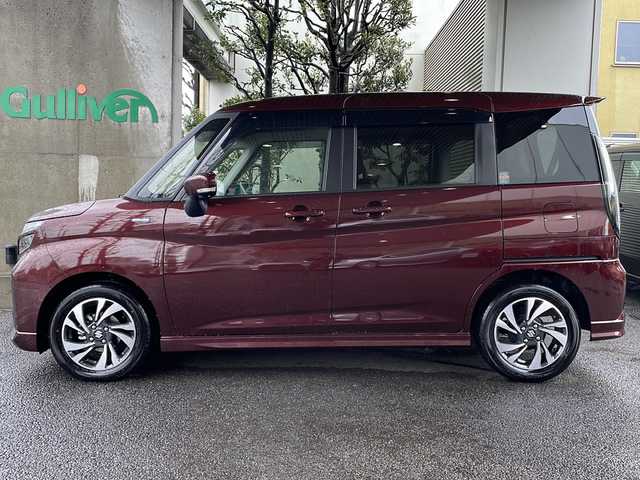 スズキ ソリオ バンディット HV MV 東京都 2021(令3)年 0.3万km メロウディープレッドパール セーフティサポート（予防安全技術）（詳細は検査員記入欄参照）/全方位モニター付メモリナビゲーション（9インチHDディスプレイ・全方位モニター）/フルセグTV・DVD/CD/BT/USB/AppleCarPlay/AndroidAuto/ワンオーナー/保証書・取説・ナビ取説/Egプッシュスタート・スマートキー×２/カラーヘッドアップディスプレイ/アイドリングストップ/前席シートヒーター/アルパイン10.1インチフリップダウンモニター（RSH10XS-R）/純正ビルトインETC/ケンウッド前後ドラレコ（DRV518S）/両側ワンタッチパワースライドドア（イージークロージャー付）/純正15インチアルミ/LEDヘッドライト・LEDフォグ＆ポジショニング・オートライト/エアロ/革巻きステア・ステアリングスイッチ/後席パーソナルテーブル＆サンシェード/充電用USB/ウィンカーミラー（電動リモート格納機能）/フロアマット・ドアバイザー/横滑り防止装置/ISOFIX