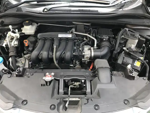 ホンダ ヴェゼル ハイブリッド Z 栃木県 2014(平26)年 6.4万km ルーセブラックM 株)IDOMが運営する【じしゃロン小山店】の自社ローン専用車両になります。こちらは現金またはオートローンご利用時の価格です。自社ローンご希望の方は別途その旨お申付け下さい//禁煙車/純正フルセグナビ/（CD/DVD/AM/FMラジオ）/(Bluetooth)/スマートキー/プッシュスタート/バックカメラ/ＥＴＣ/シティブレーキアクティブシステム/クルーズコントロール/ルーフレール/コーナーセンサー/シートヒーター/パドルシフト/チップアップシート/ステアリングリモコン/電動格納ドアミラー/パワーウインドウ/自動防眩ミラー/オートライト